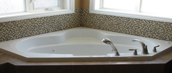 image of a bath tube installation by tryangle mechanical